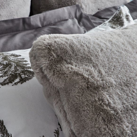 grey furry cushions