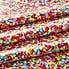 By the Metre Smarties Printed PVC MultiColoured