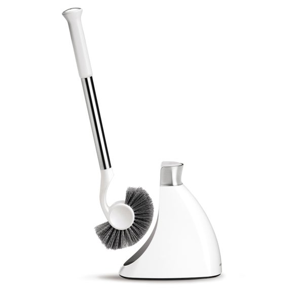 Thin toilet outlet brush