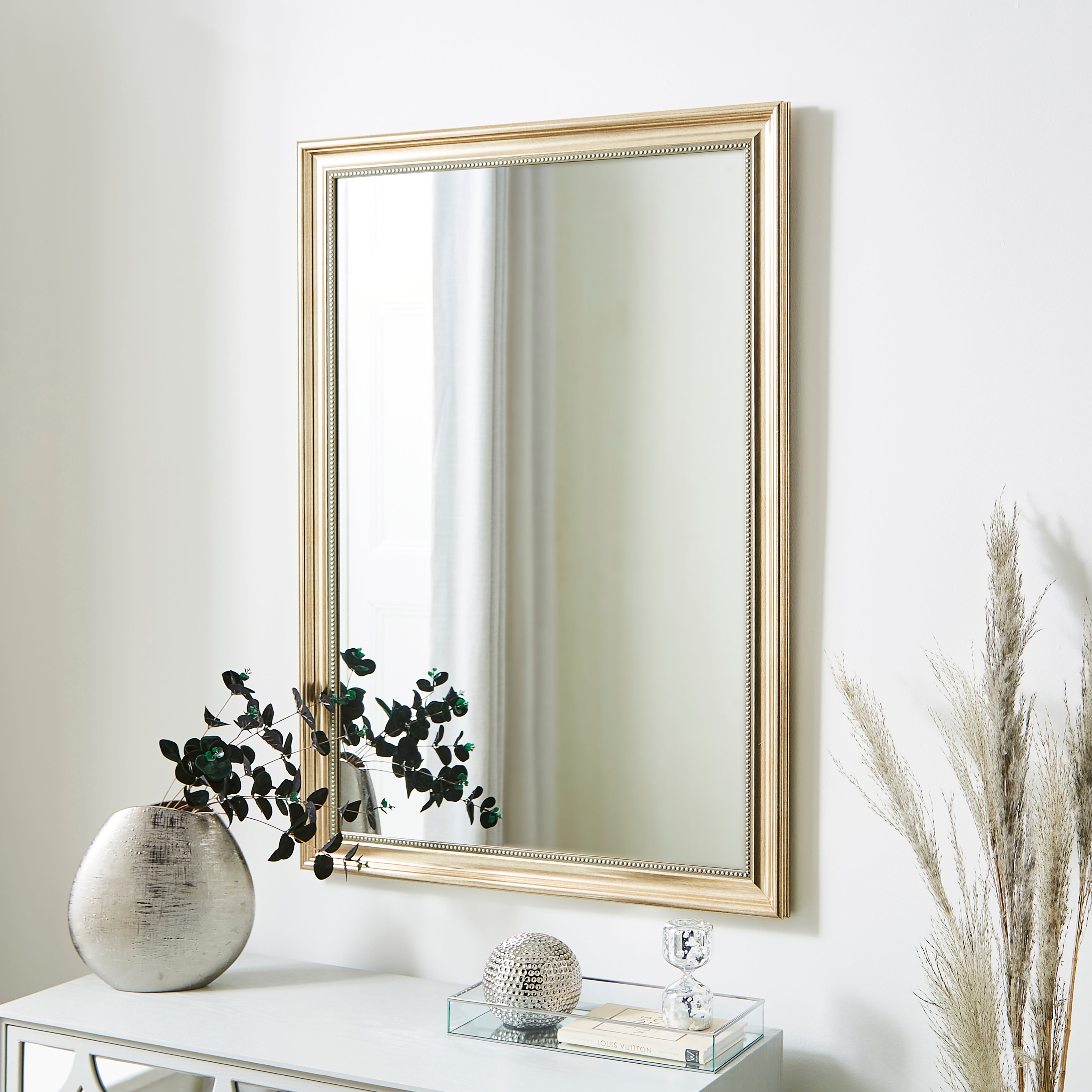 Click to view product details and reviews for Beaded Edge Wall Mirror 101x71cm Gold Effect Champagne.