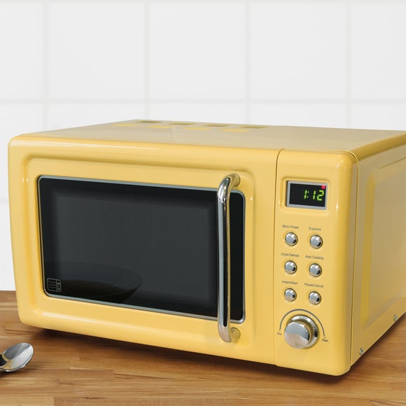 yellow microwave and kettle