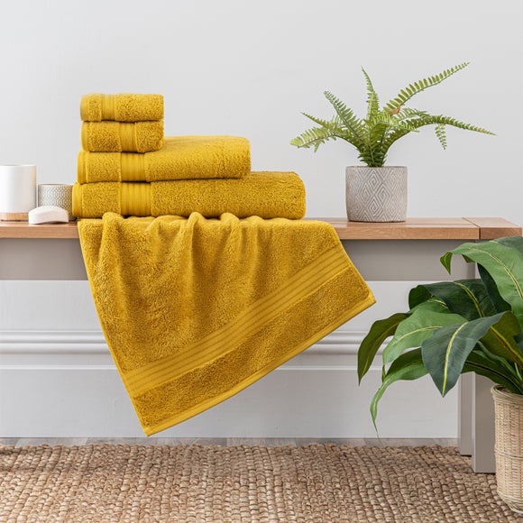 yellow and grey bath towels