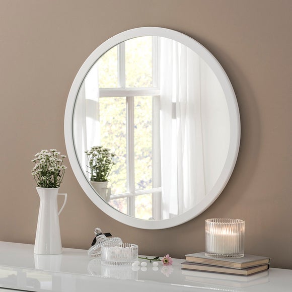 white round mirror wall