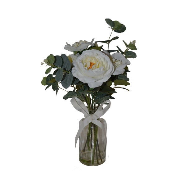 white artificial flowers in vase