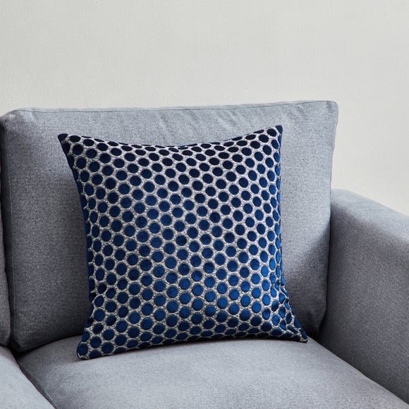 Silver and navy store cushions