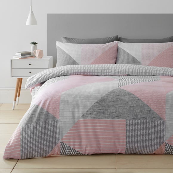 grey and pink geo bedding