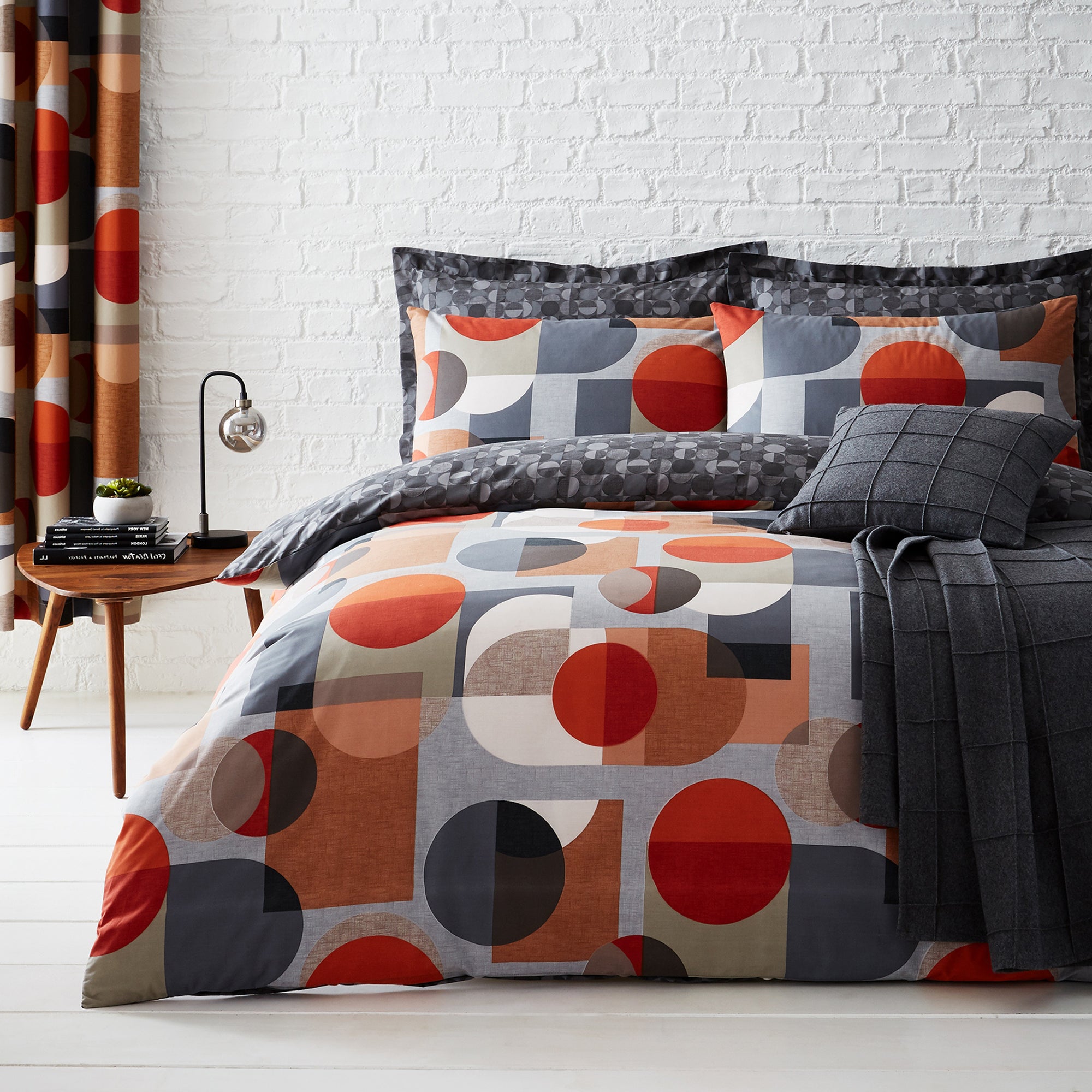 Photo of Elements oscar reversible orange duvet cover and pillowcase set orange- red and grey