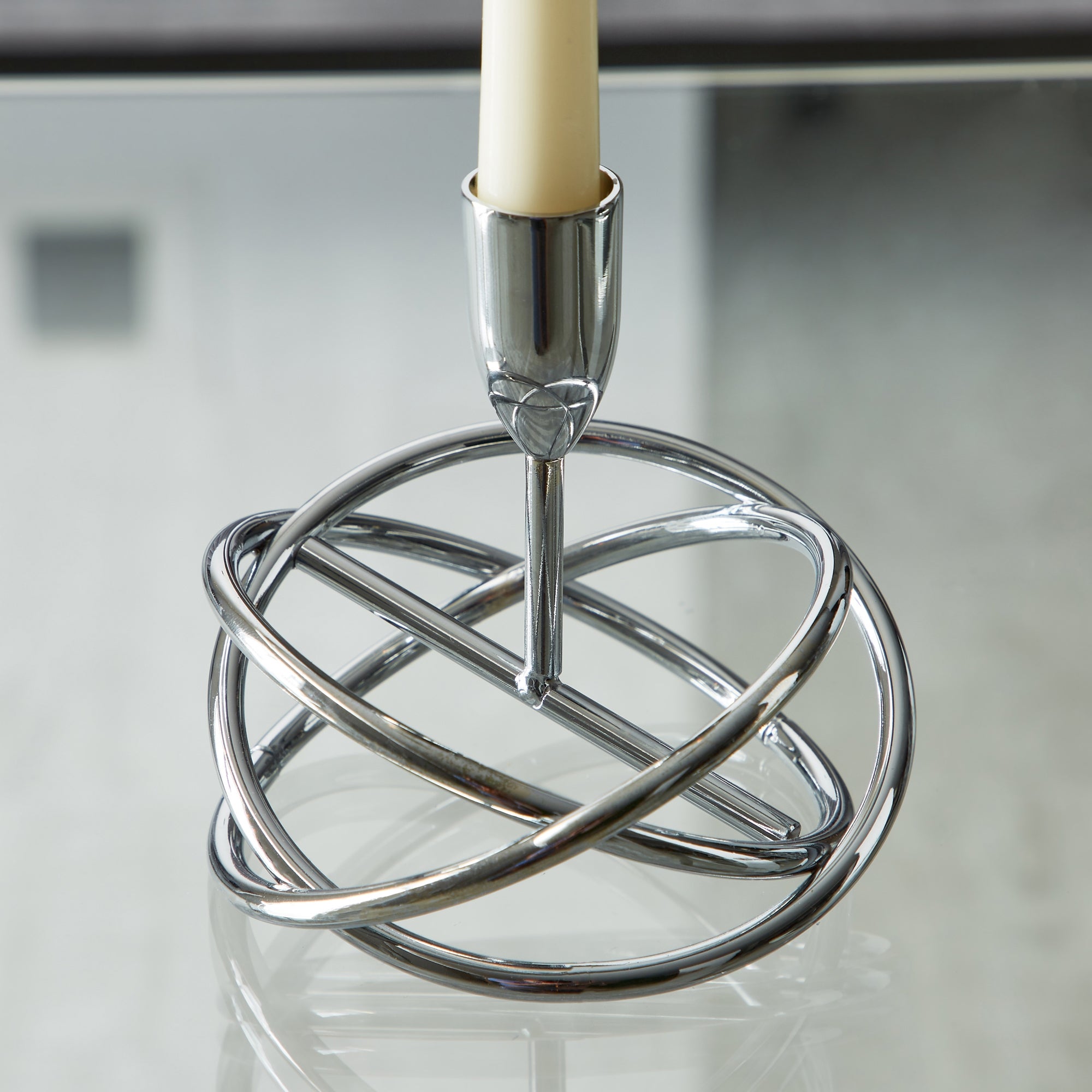 Click to view product details and reviews for Dorma Circle Silver Candlestick Silver.