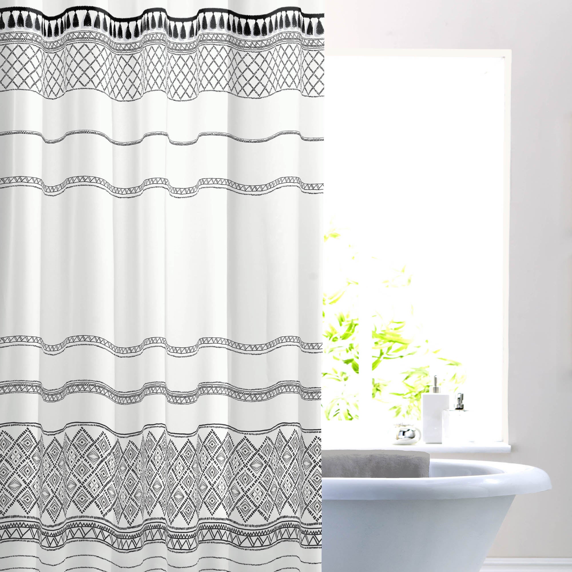 Nomadic Tassel Monochrome Shower Curtain | Dunelm