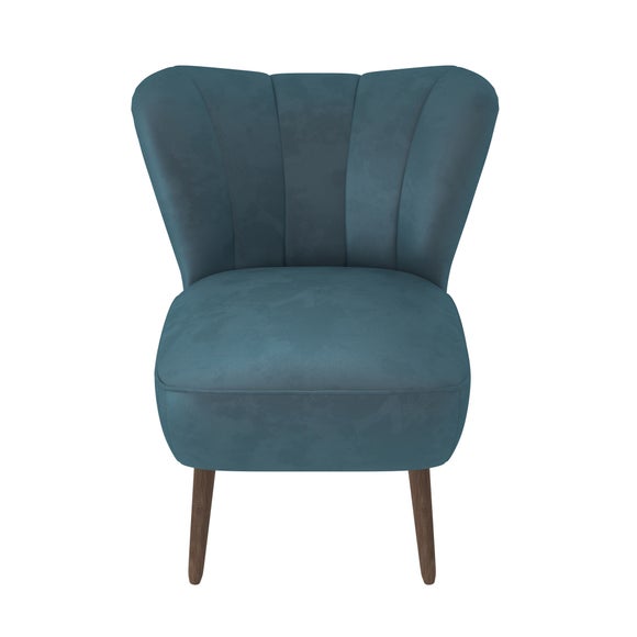 green upholstered armchair