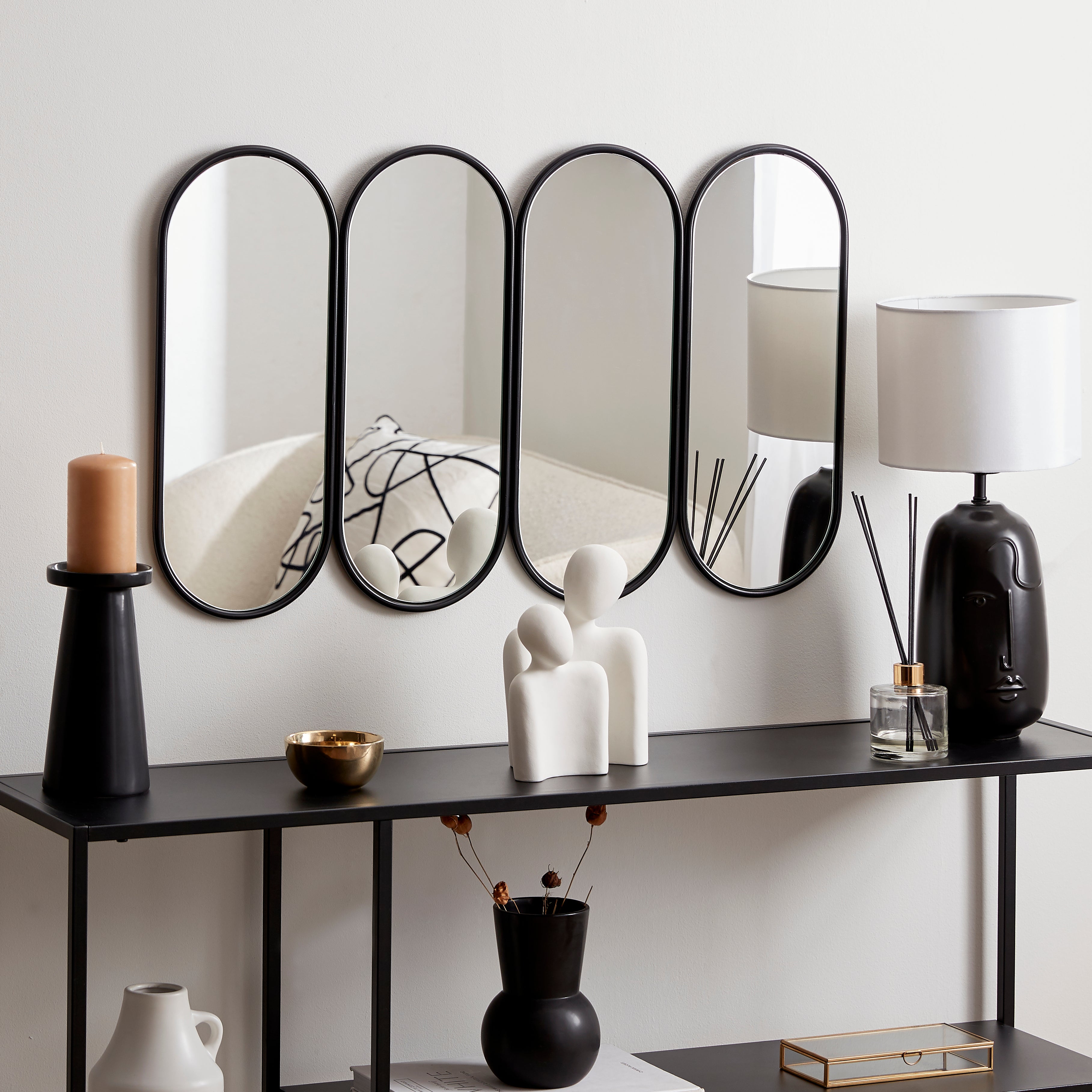 Click to view product details and reviews for Lozenge 80cm X 49cm Wall Mirror Black.