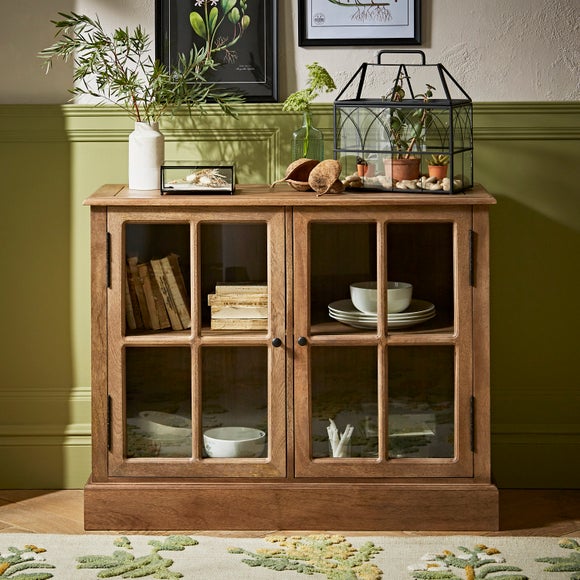 Narrow curio cabinet with store glass doors