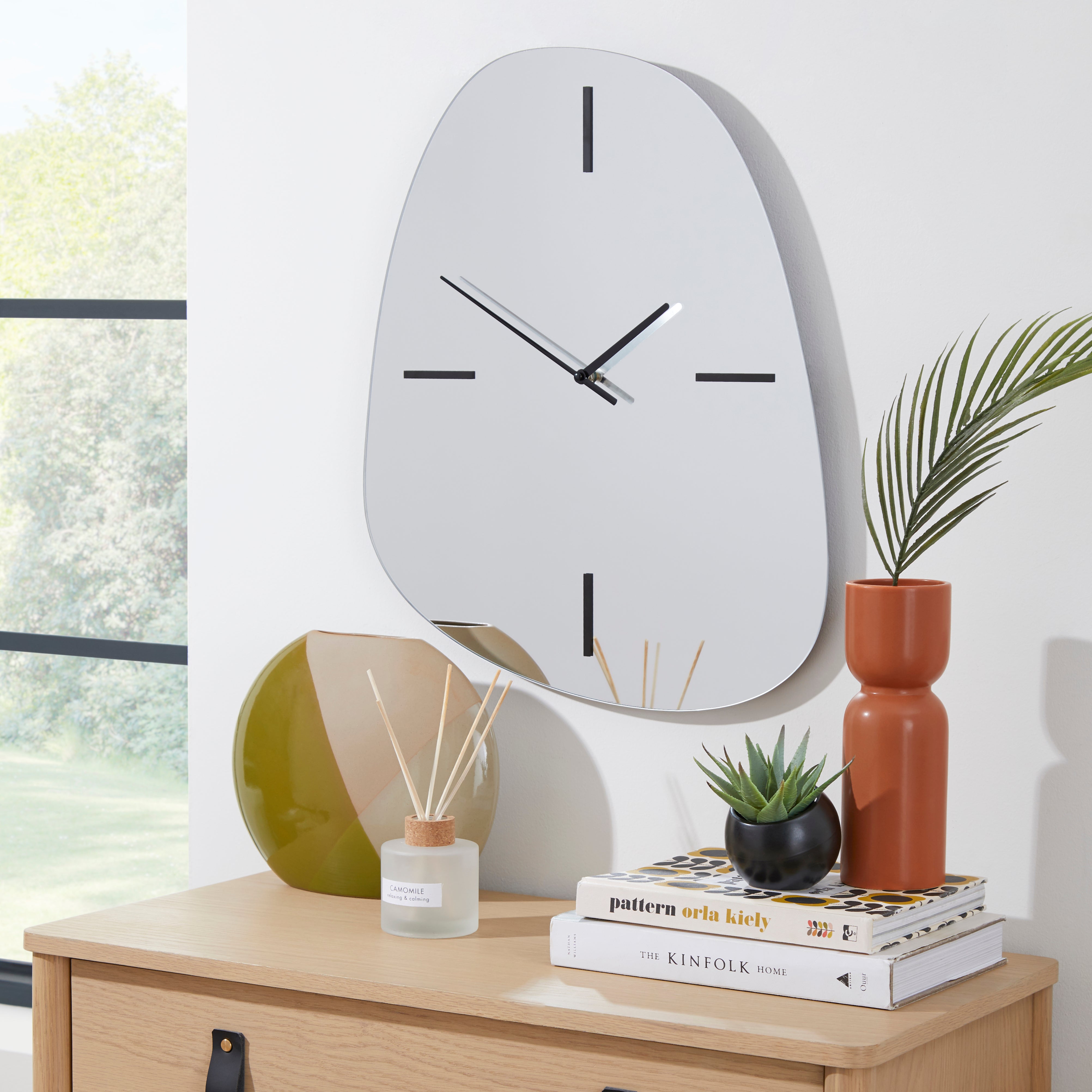 Frameless Pebble Mirrored Wall Clock