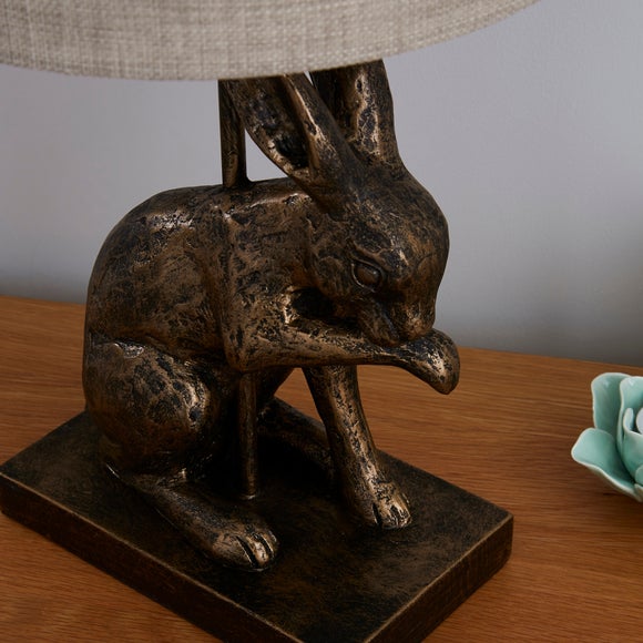 hare licking paw lamp