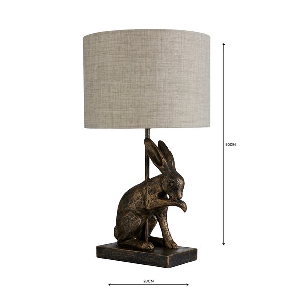 hare licking paw lamp