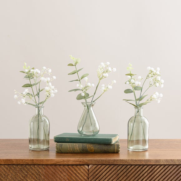 Click to view product details and reviews for Artificial Set Of 3 Eucalyptus And Gypsophila Stems In Glass Vases.