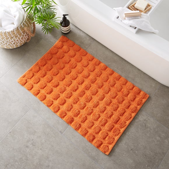 Orange bathroom store rug