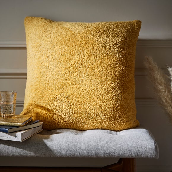 Mustard yellow shop cushions and throws