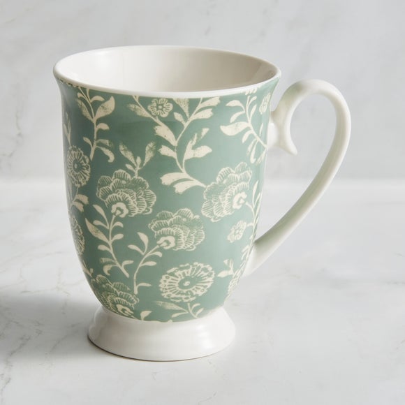 Footed teacup clearance