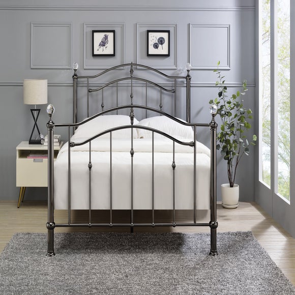 Metal headboard deals with crystal knobs