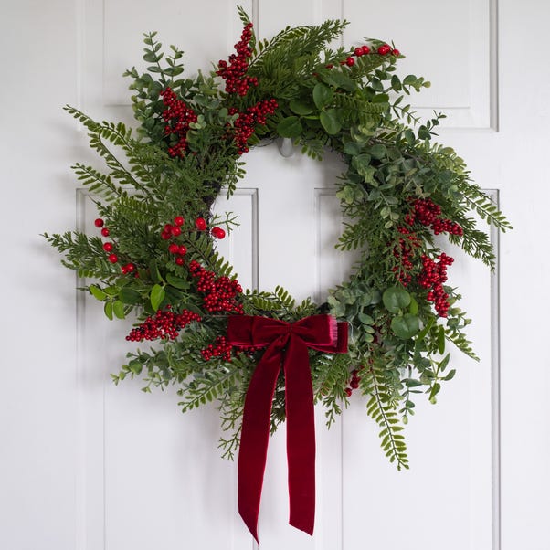 55cm Artificial Red Berry & Pinecone Red Velvet Bow Wreath  image 1 of 3