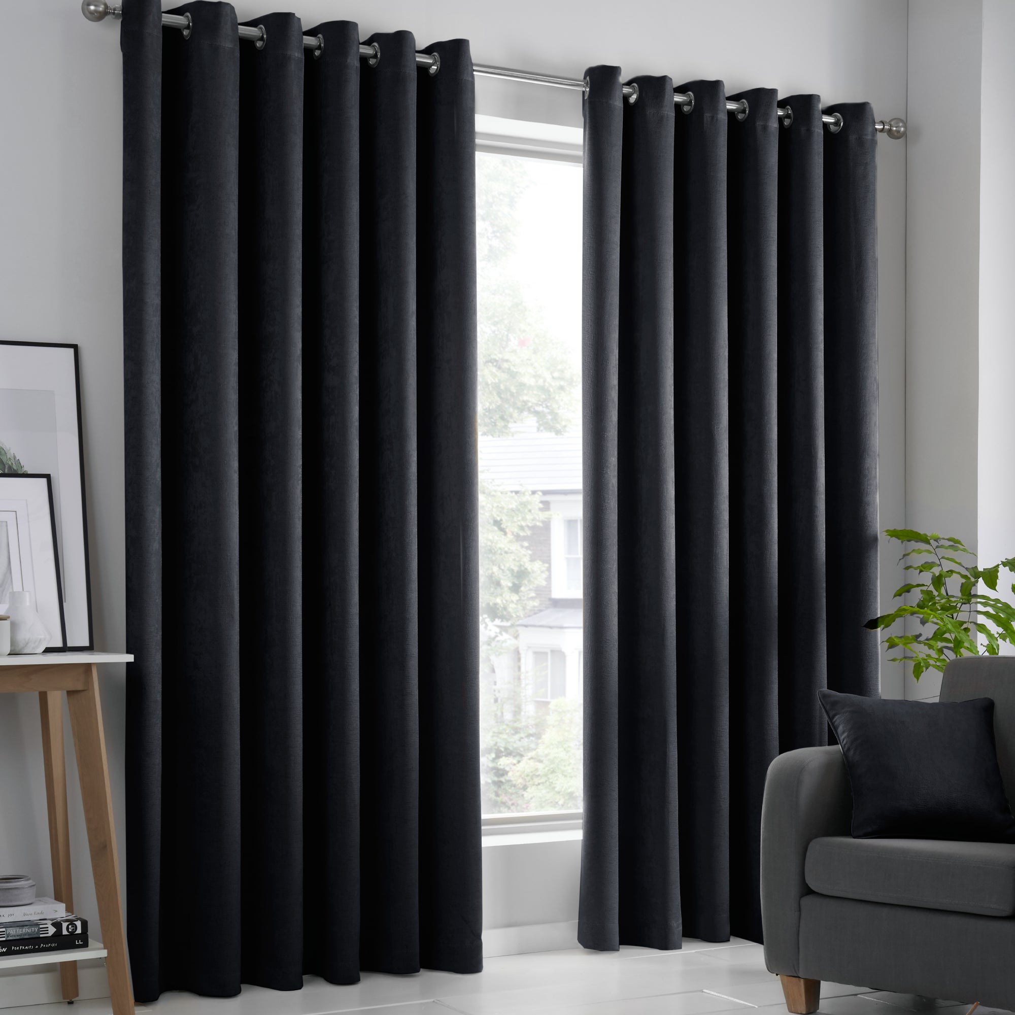 Fusion Strata Dim Out Woven Black Eyelet Curtains | Dunelm