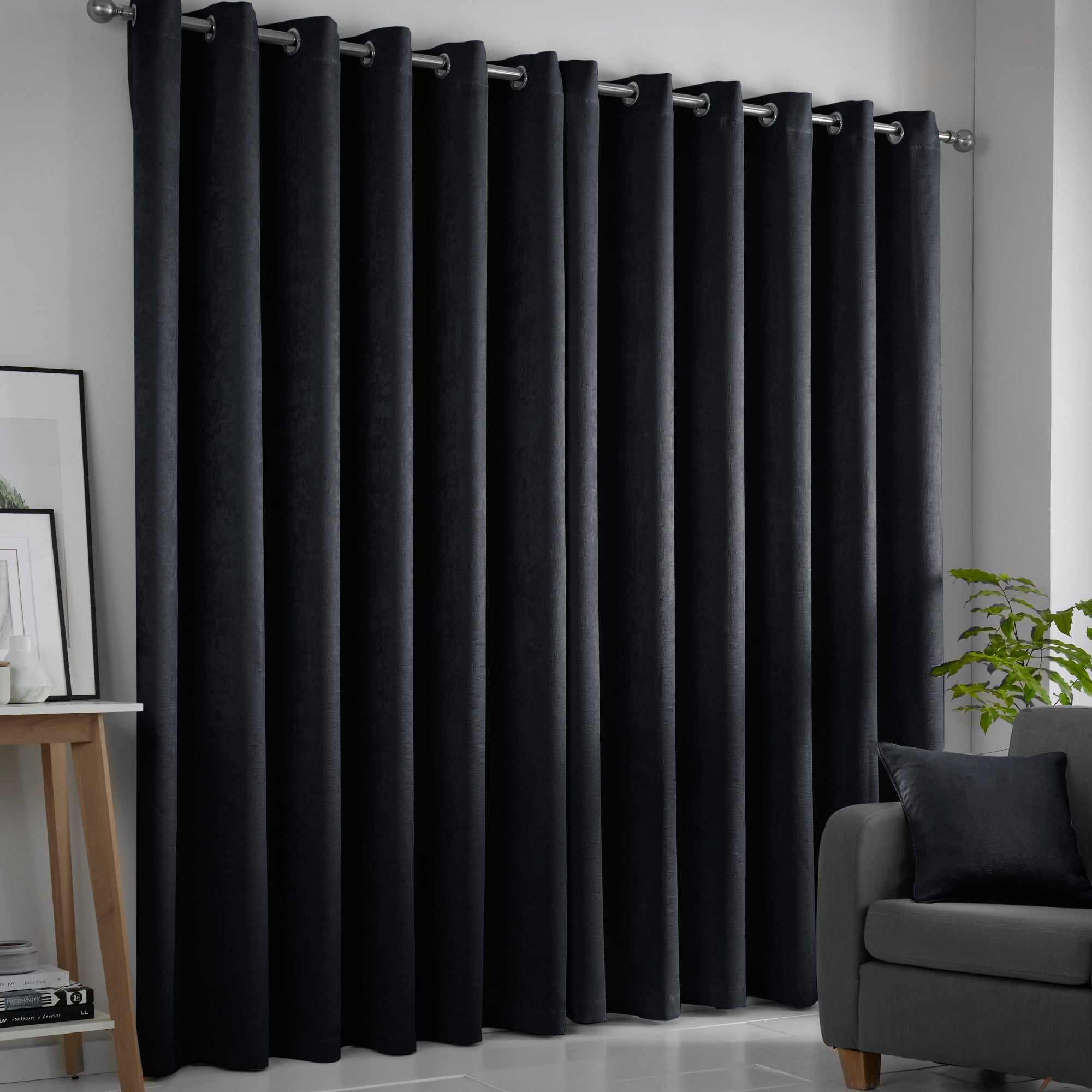 Fusion Strata Dim Out Woven Black Eyelet Curtains | Dunelm