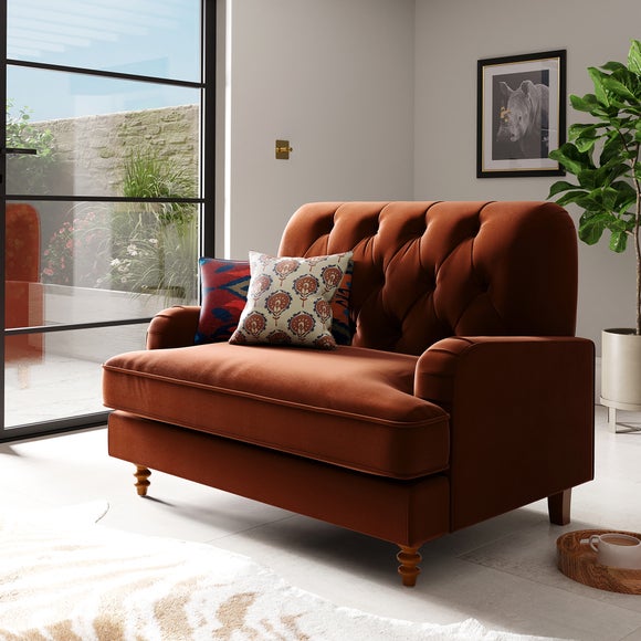 Click to view product details and reviews for Beatrice Buttoned Velvet Snuggle Chair.