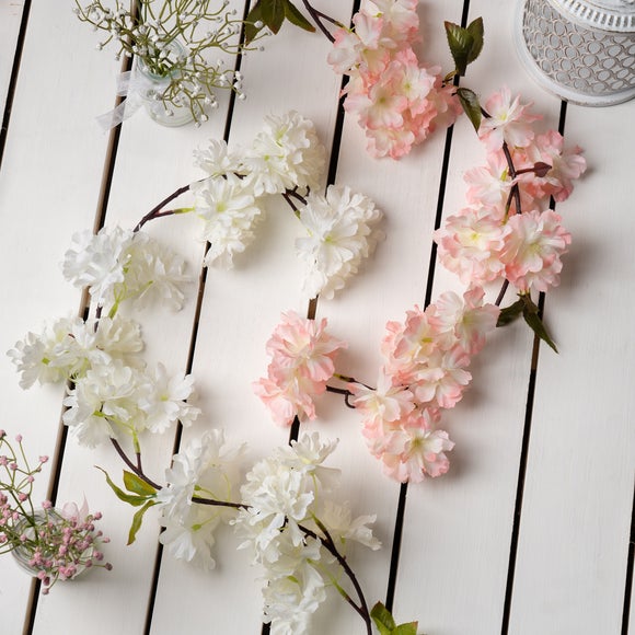 Click to view product details and reviews for Set Of 2 Artificial Cherry Blossom Garlands.