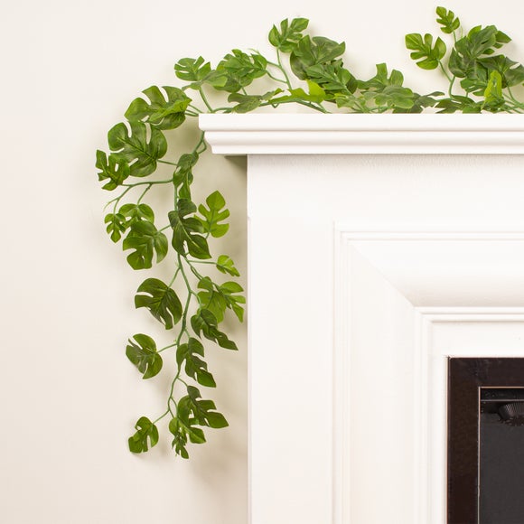 Click to view product details and reviews for Set Of 2 Artificial Monstera Garlands.