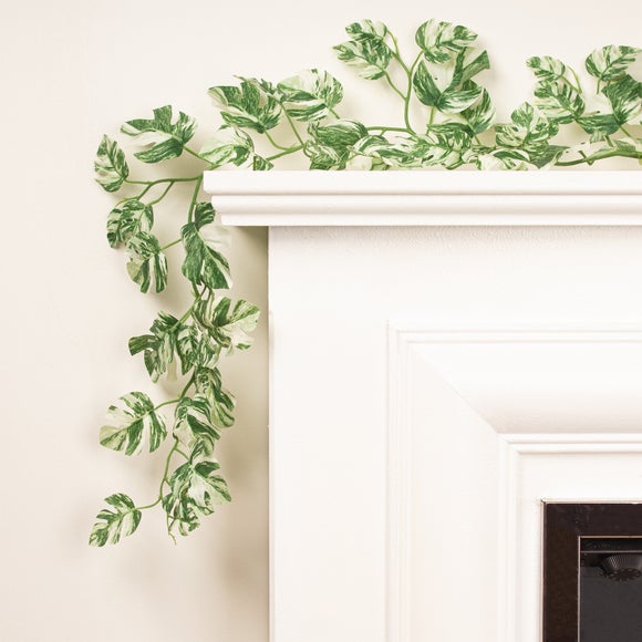 Click to view product details and reviews for Set Of 2 Artificial Variegated Monstera Garlands.