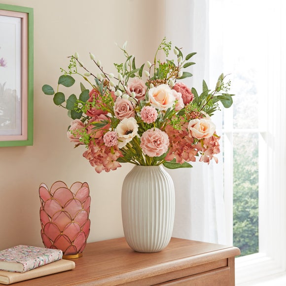 Click to view product details and reviews for Artificial Pink Florals Foliage Bouquet In Ribbed Ceramic Vase.