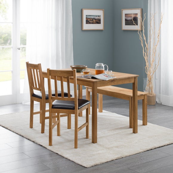 Click to view product details and reviews for Coxmoor 4 Seater Rectangular Dining Table Off White Solid Oak.