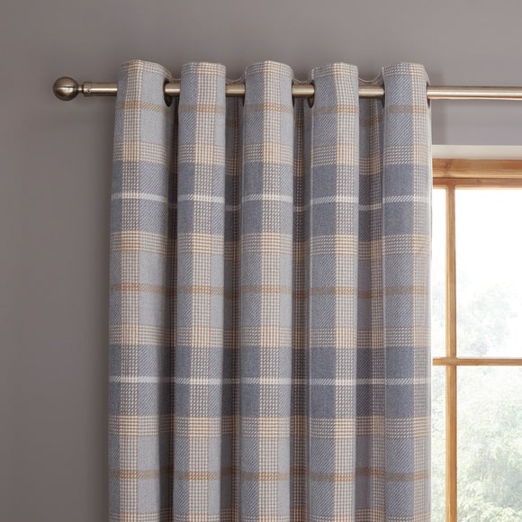 Click to view product details and reviews for Ember Chenille Thermal Navy Eyelet Curtains.