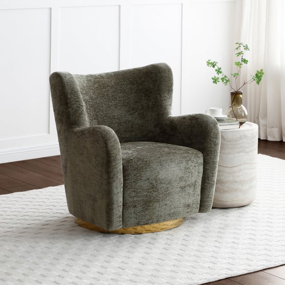 Click to view product details and reviews for Theo Distressed Chenille Swivel Armchair.