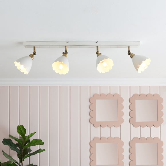 Click to view product details and reviews for Remi Scalloped 4 Light Adjustable Spotlight Bar.