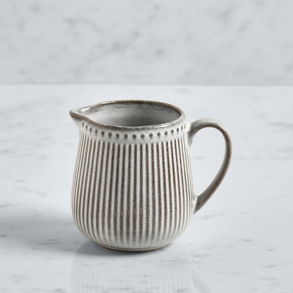 Click to view product details and reviews for Steeple Embossed Milk Jug.