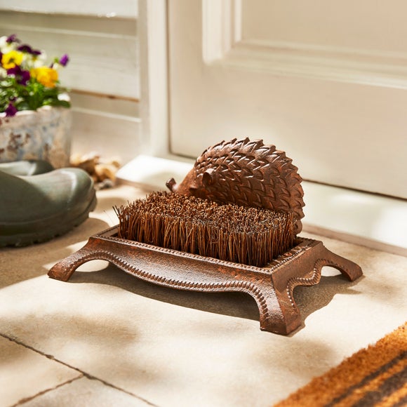 Click to view product details and reviews for Cast Iron Hedgehog Boot Brush.