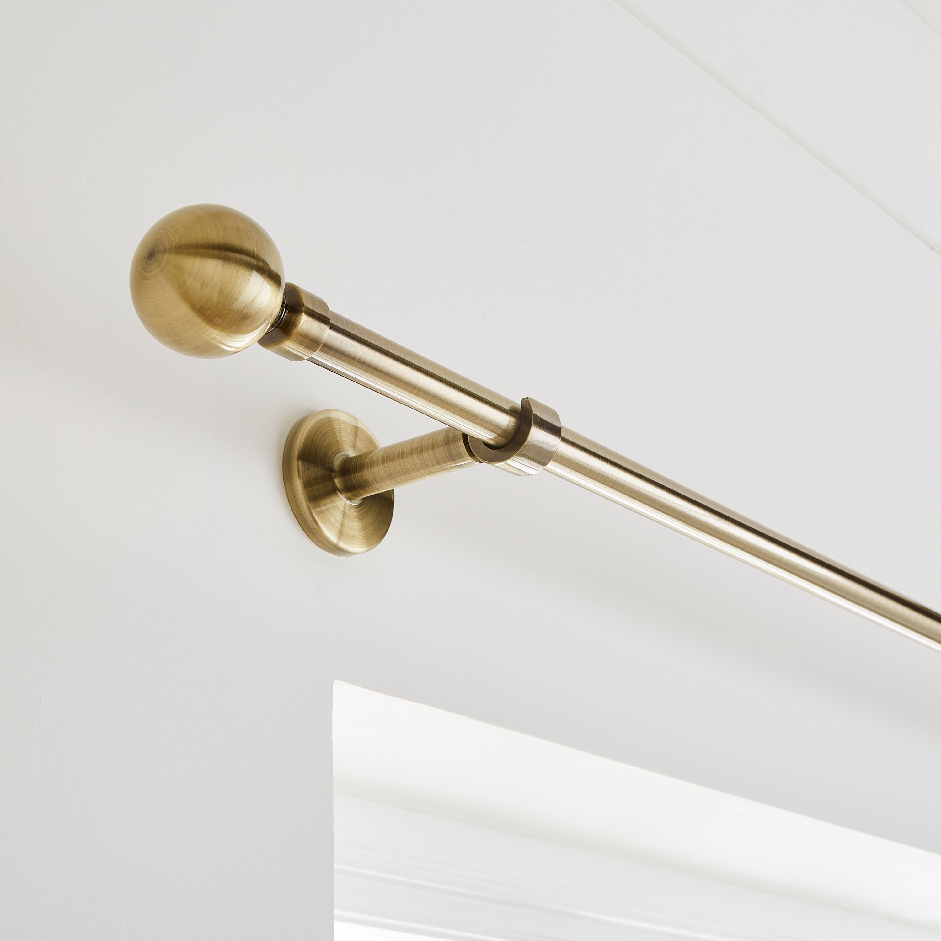 Ashton Extendable Metal Eyelet Curtain Pole Antique Brass