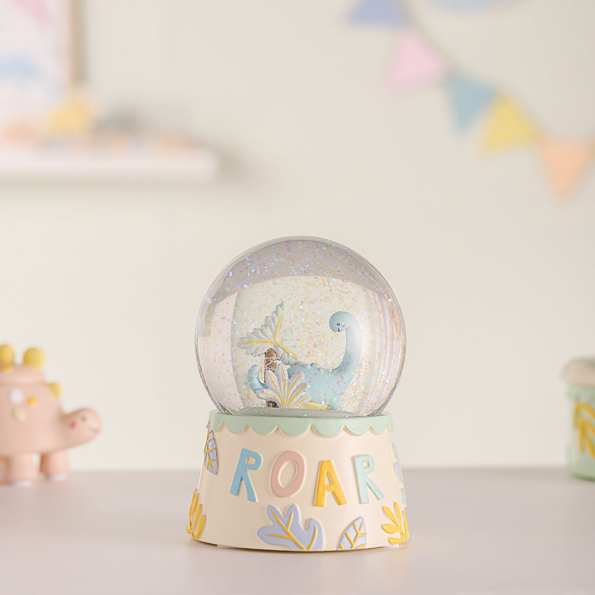 Petit Cheri Dinosaur Roar Snow Globe