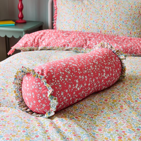 Click to view product details and reviews for Ditsy Frill Bolster Cushion.