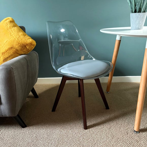Click to view product details and reviews for Fusion Living Soho Clear Plastic Dining Chair With Squared Legs.