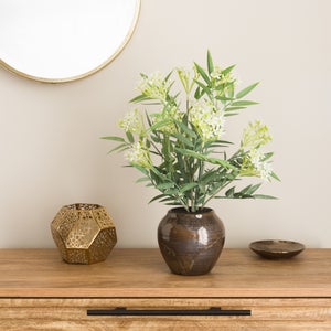 Artificial Floral Arrangement In Ceramic Vase