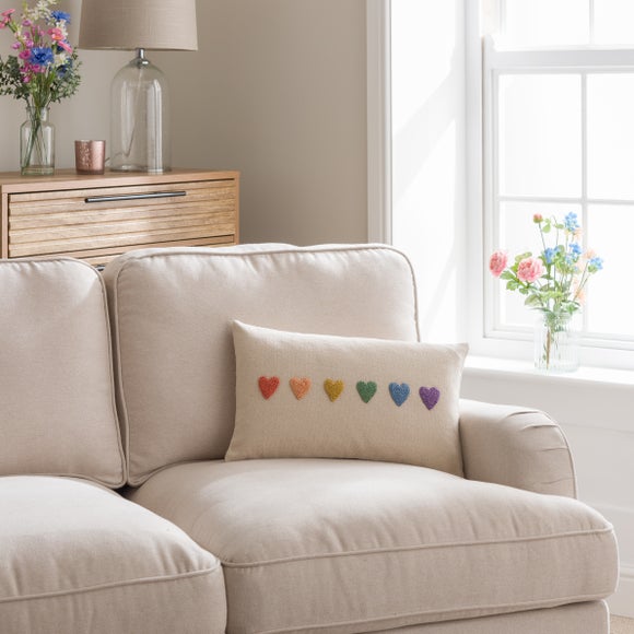 Click to view product details and reviews for Knotted Rainbow Hearts Rectangular Cushion.