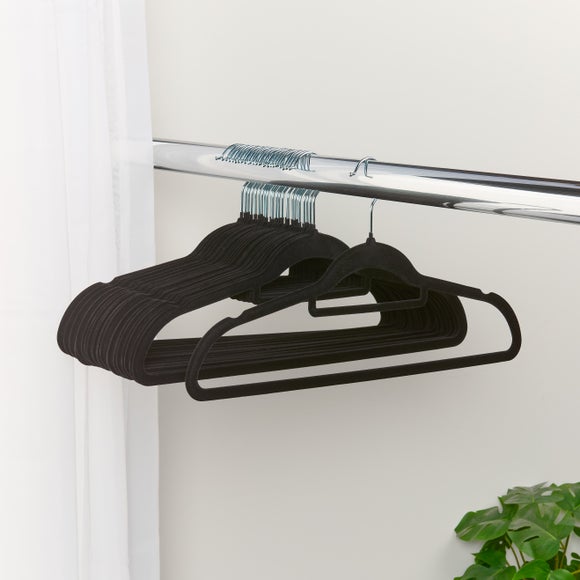 Click to view product details and reviews for Set Of 25 Black Flocked Hangers. Click to view product details and reviews for Set Of 25 Black Flocked Hangers.