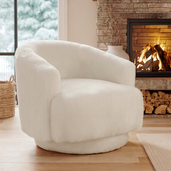 Click to view product details and reviews for Carmen Faux Fur Curved Swivel Chair.