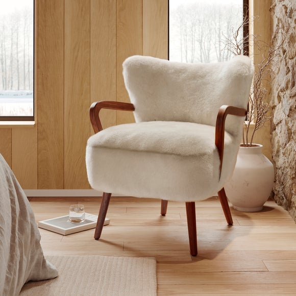 Click to view product details and reviews for Eliza Supersoft Faux Fur Wooden Arm Occasional Chair.
