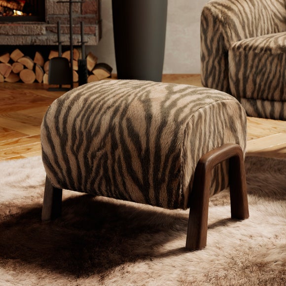 Click to view product details and reviews for Zebra Print Faux Fur Curved Wooden Footstool.