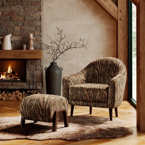 Click to view product details and reviews for Kaspar Zebra Print Faux Fur Tub Chair.