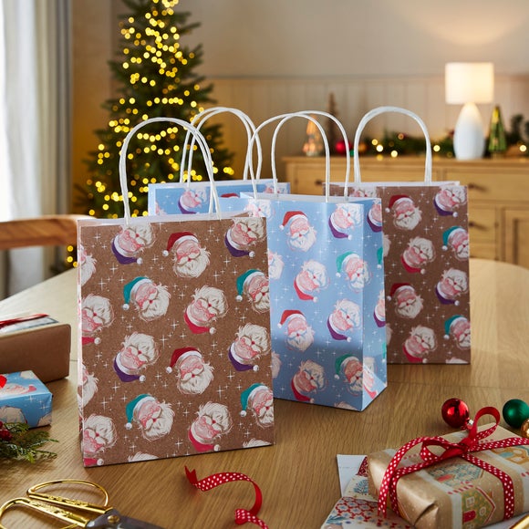 Click to view product details and reviews for Pack Of 4 Santa Gift Bags.